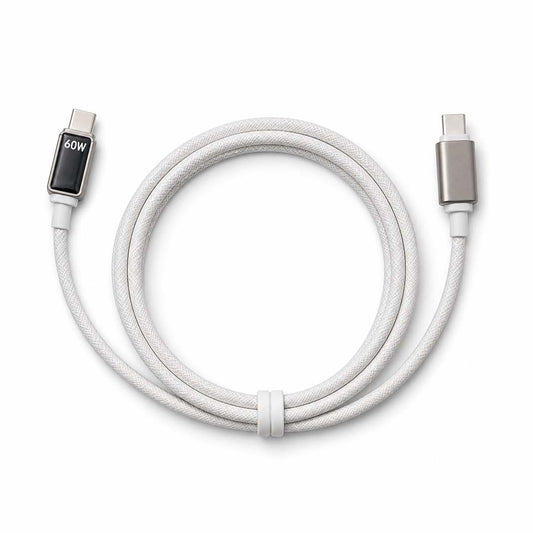 White charging cable with connectors on a white background