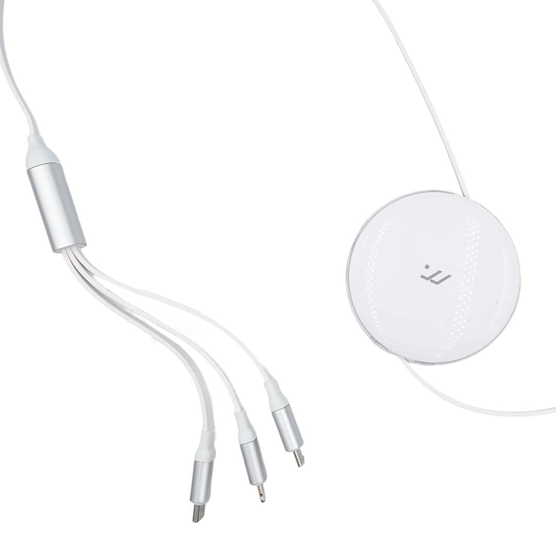 White charging cable and round wireless charging pad on a white background