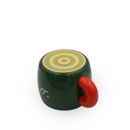 Small green and red bluetooth speaker with a gold circular component on a white background